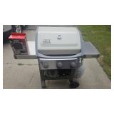 Weber Spirit II Gas Grill with propane tank and
