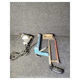 Drill, hand saw, caulk gun