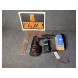 No trespassing sign, hand drill, palm sander