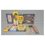 Paint brushes, markers, colored pencils
