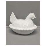 Chick Sitting on a Nest