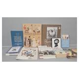 Sketch book, paper dolls, coffee table books