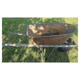 Metal wheelbarrow with wood frame