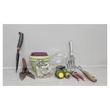 Prunes, trowels, table clips, pots, more