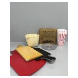 Popcorn tubs (4), plastic cookie tray, chopping