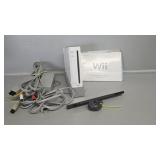 Nintendo WII Console with cords, and books