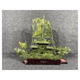 Decorative carved green stone dragon boat
