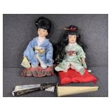 Oriental Porcelain kneeling dolls