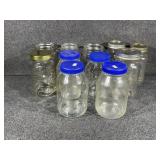 11 Glass jars- some with lids