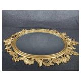 Gold color mirror oval