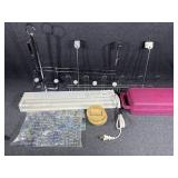 Plug in small shop light. Cassette tapes and case