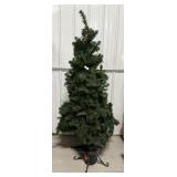 6ft Christmas Tree with multi colored lights.