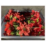 Rubbermaid tub of Christmas artificial flowers