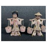 Asian Boy & Girl  water carriers.