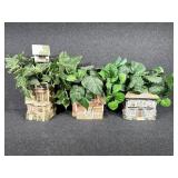 Ceramic house row with greenery