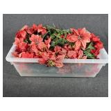 RUBBERMAID Tub with artifical flowers.