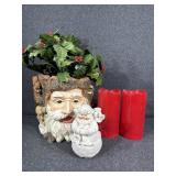 Ceramic Santa head planter. Artificial flowers.