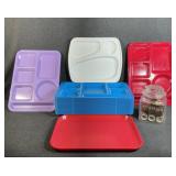 Stack of Plastic Eating Trays, Glass Jar Full Of