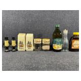 Salt and pepper shakers, olive oil, honey