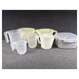 Measuring cups, mixing bowls, steaming container