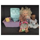 Tote of dolls & stuffed animals