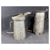 Metal measuring Jugs used for oil