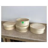 Three cheese boxes with lids one without lid