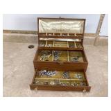 Collection of costume jewelry in box