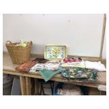 Assorted table linens in basket