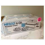 A small electric roaster oven A small electric roaster oven