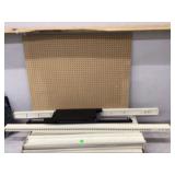 Metal shelving unit taken apart