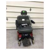 Used power chair with charger repaired in spots broken armrest