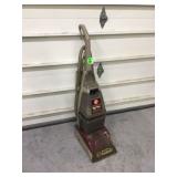 Carpet cleaning machine with power