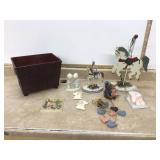 Decorative container with miscellaneous home decor items