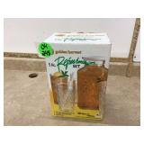 Glass pitcher and four cups