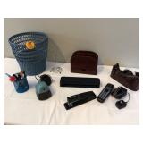 Various office supplies in basket