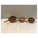 3 clear glass pots with lids