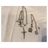 Religious jewelry including rosaries
