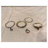 5 jewelry items 3 costume bracelets 2 spoon ring and bracelet