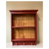 Red wood shelf with hooks Red wood shelf with hooks