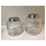 Two glass canisters unused Two glass canisters unused