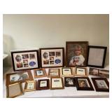 Assorted picture frames in storage tote Assorted picture frames in storage tote