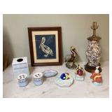 Coastal-themed decorations featuring seashells fish and pelicans Coastal-themed decorations featuring seashells fish and pelicans