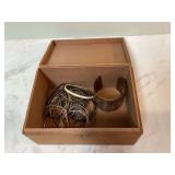 Wooden box with bracelets inside Wooden box with bracelets inside