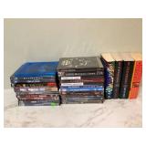 Collection of 23 DVDs and 4 books Collection of 23 DVDs and 4 books