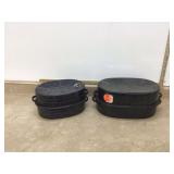 Two black enamel roasting pans with lids Two black enamel roasting pans with lids