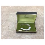 Vintage inspired horseshoe money clip with rhodium finish in a mid-century Vintage inspired horseshoe money clip with rhodium finish in a mid-century