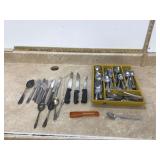 Variety of flatware and utensils Variety of flatware and utensils