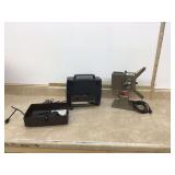 1 Two vintage movie projectors running 1 Two vintage movie projectors running