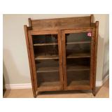Antique oak display cabinet with glass doors